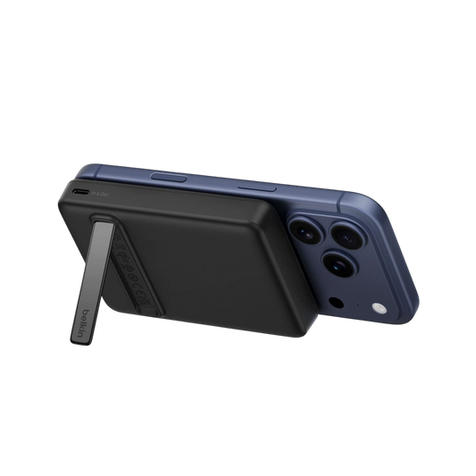 Belkin Qi2 magnetic power bank 10K in black on an iPhone with kickstand open