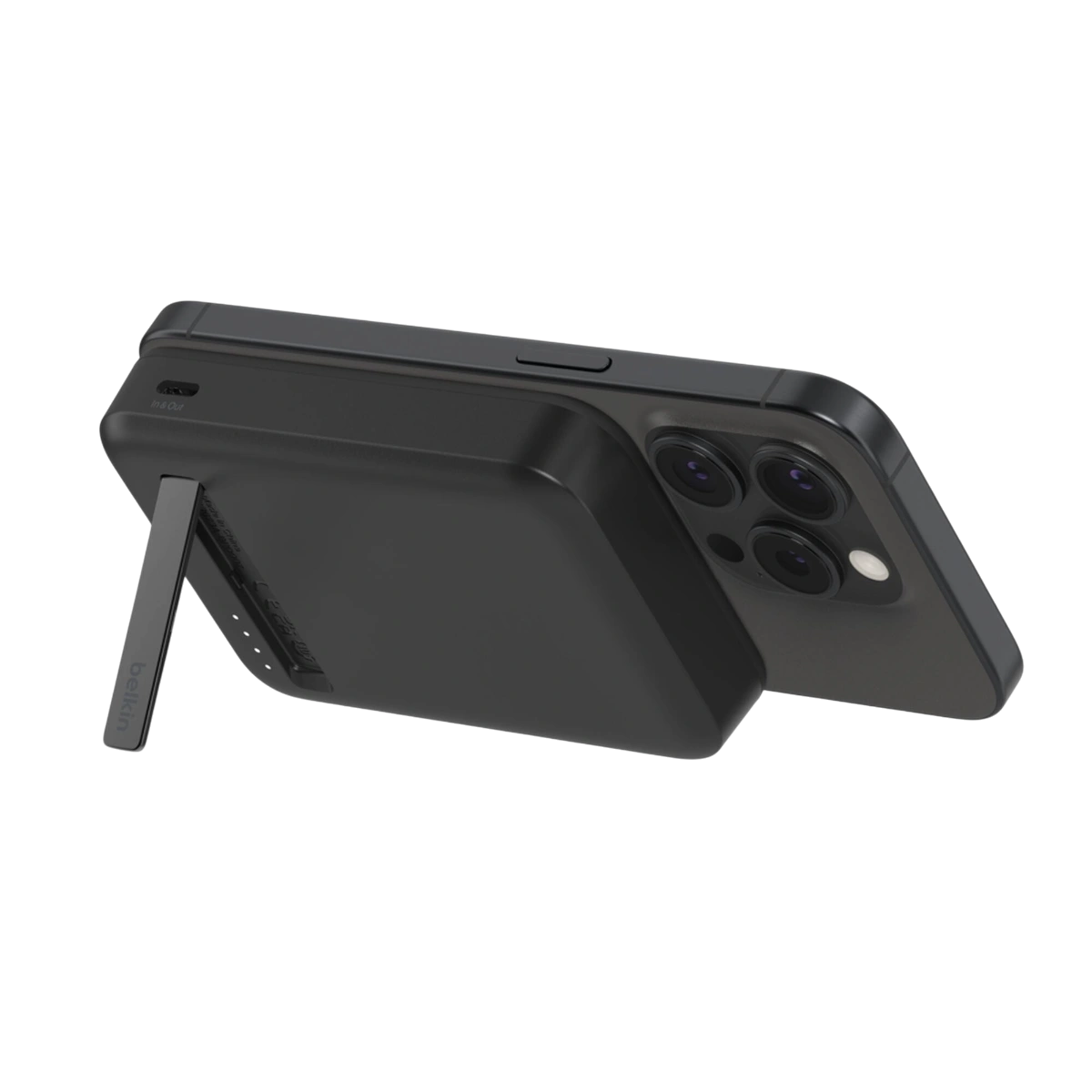 Belkin Qi2 power bank with kickstand holding a phone in landscape