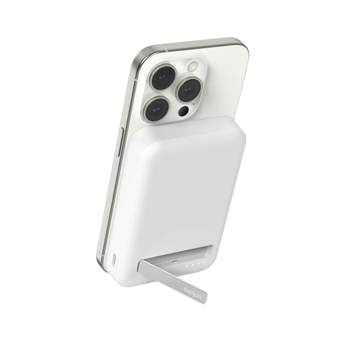 Belkin BoostCharge Pro Qi2 magnetic power bank in white on an iPhone